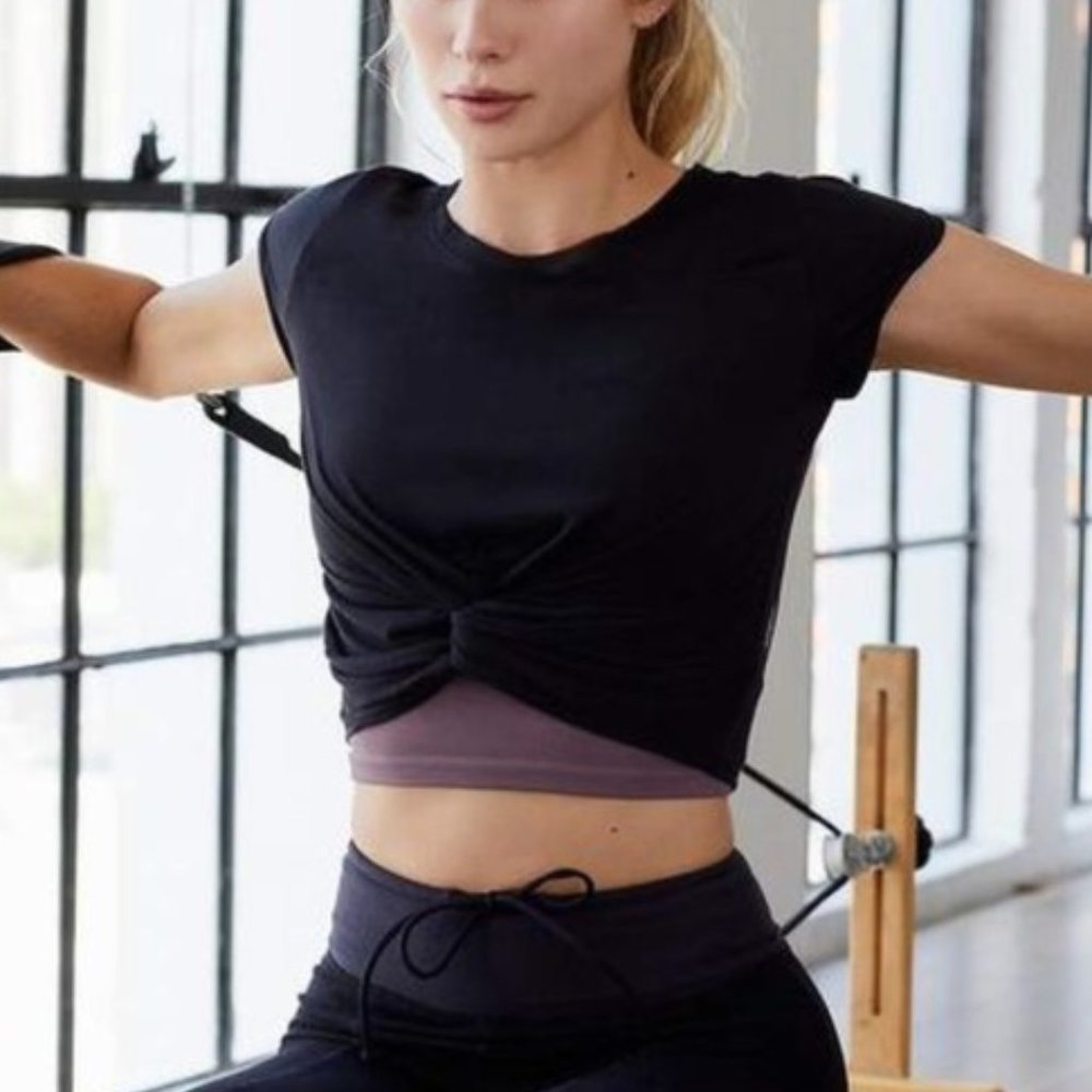 NEW! FREE PEOPLE MOVEMENT run in the sun solid black basic knot crop top tee​